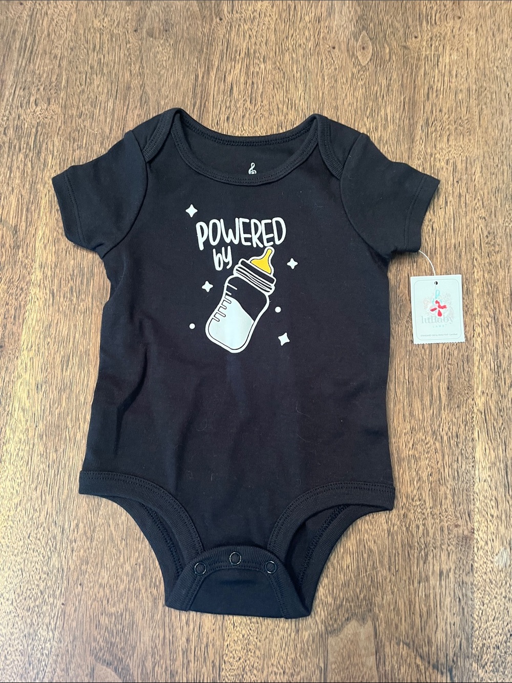 Lullaby Lane Black Baby Bodysuit with Bottle Graphic